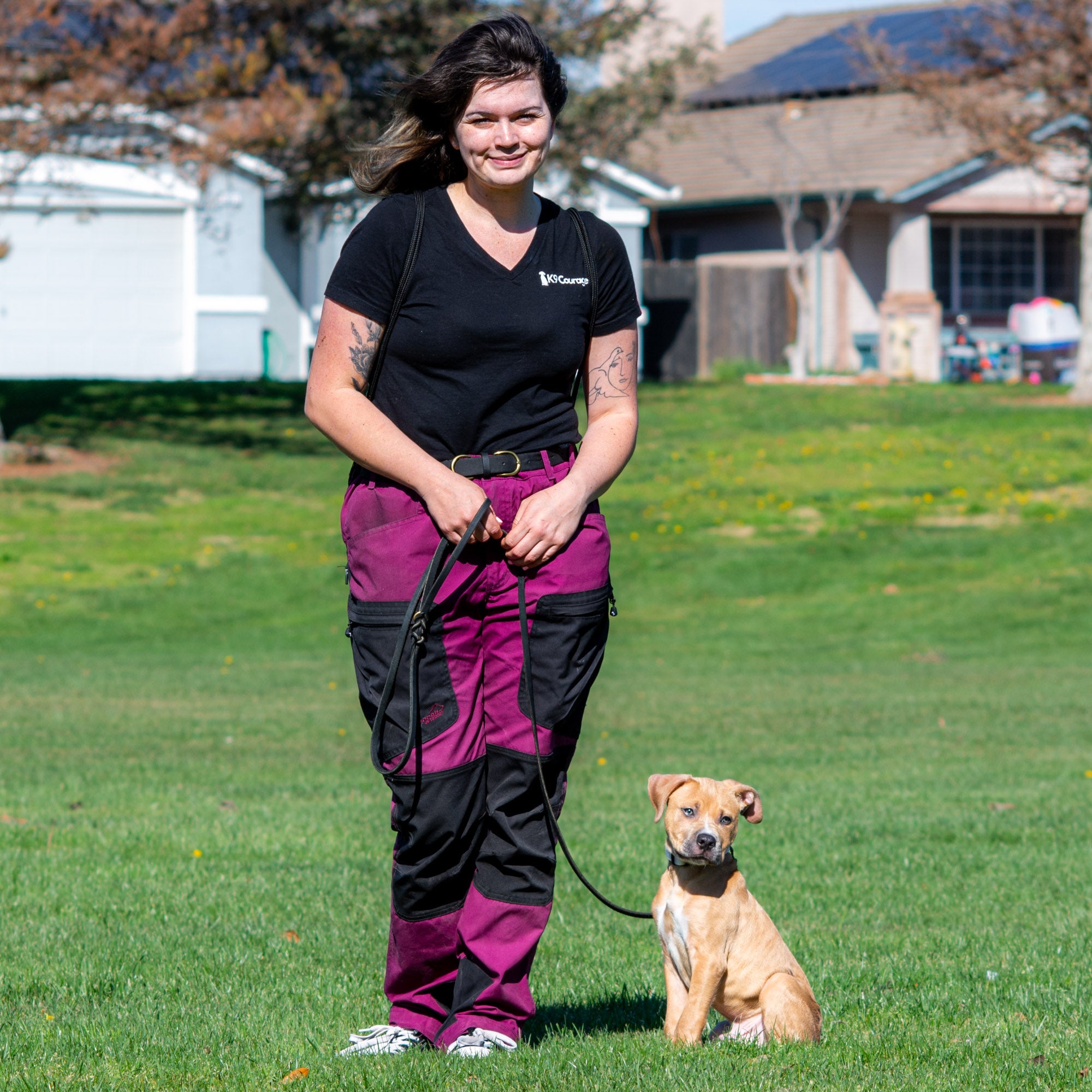 Lily from K9 Courage Dog Training with puppy at woodward park during training session in Manteca CA